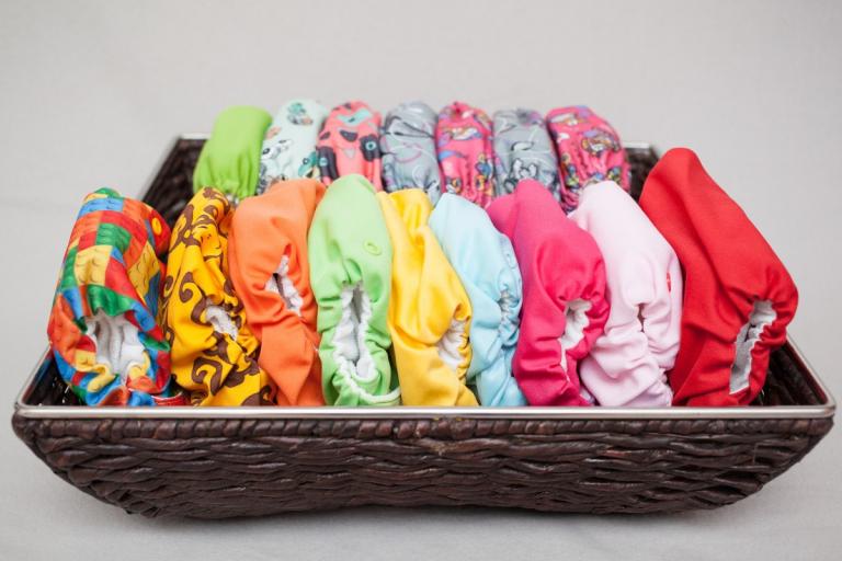 image of colourful cloth nappies in basket