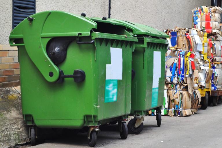 Large green business waste bins.