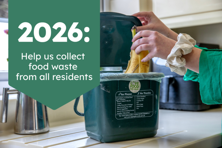 Person putting banana peel in food recycling caddy 