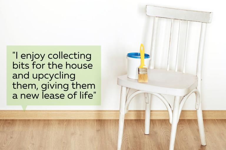 A freshly painted white wooden chair with a bucket and brush placed on it. This is accompanied by the text "I enjoy collecting bits for the house and upcycling them, giving them a new lease of life".