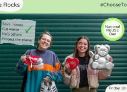 Two women in front of a green background and showing the camera some items they have recently freegled. The image reads “Reuse Rocks, #ChooseToReuse and National Reuse Day Friday 18 October”