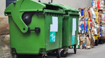 Large green business waste bins.