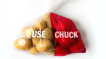 Bag of potatoes with use and chuck written on top. Half the bag is red to indicate amount wasted.